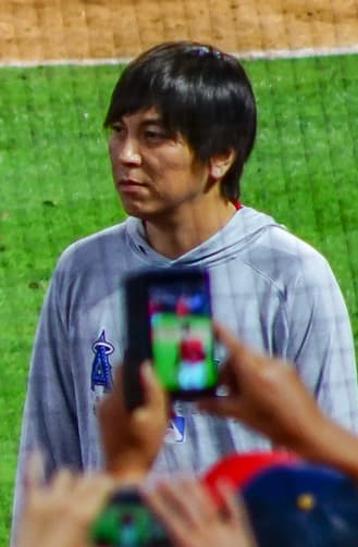 Ippei Mizuhara (with Shohei Ohtani) at Angel Stadium, June 8, 2019. Taken years before the scandal, not the moment.